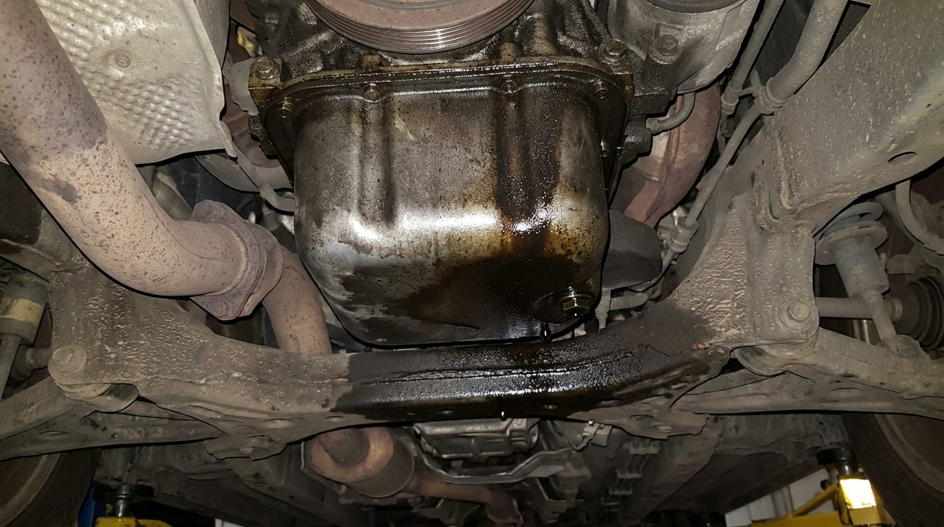 What causes oil pan leaks?
